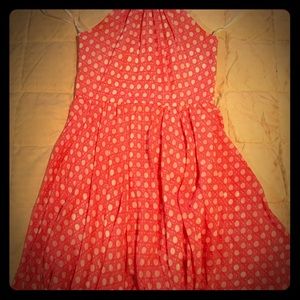 Halter dress with full bottom. Very feminine.